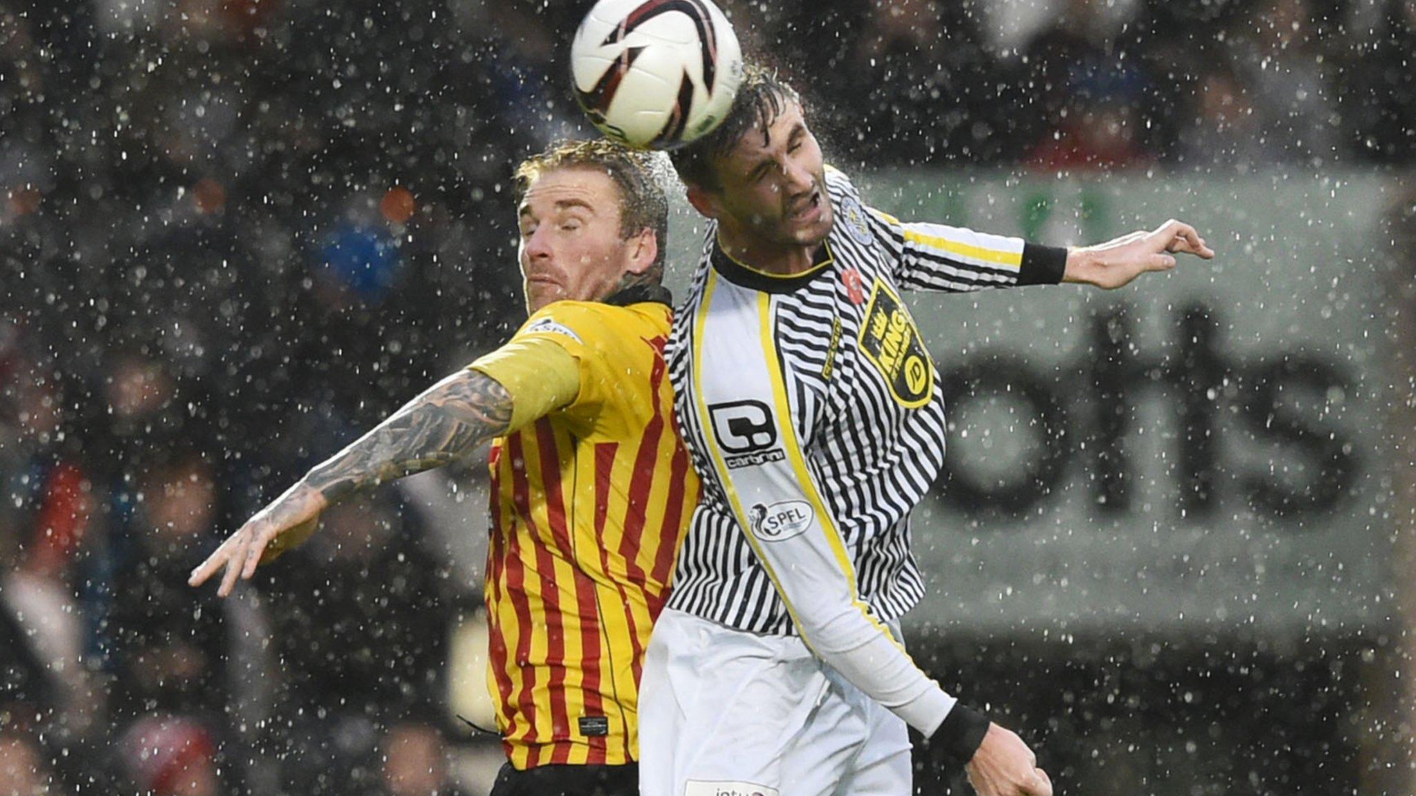 Partick Thistle's Ryan Stevenson (left) challenges Callum Ball