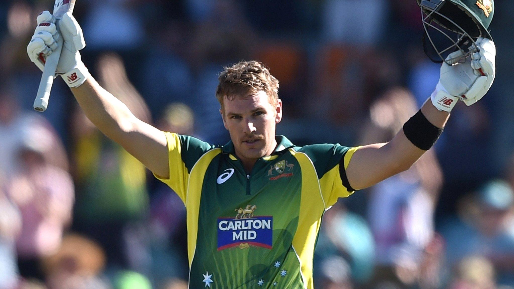 Australia's Aaron Finch celebrates his century