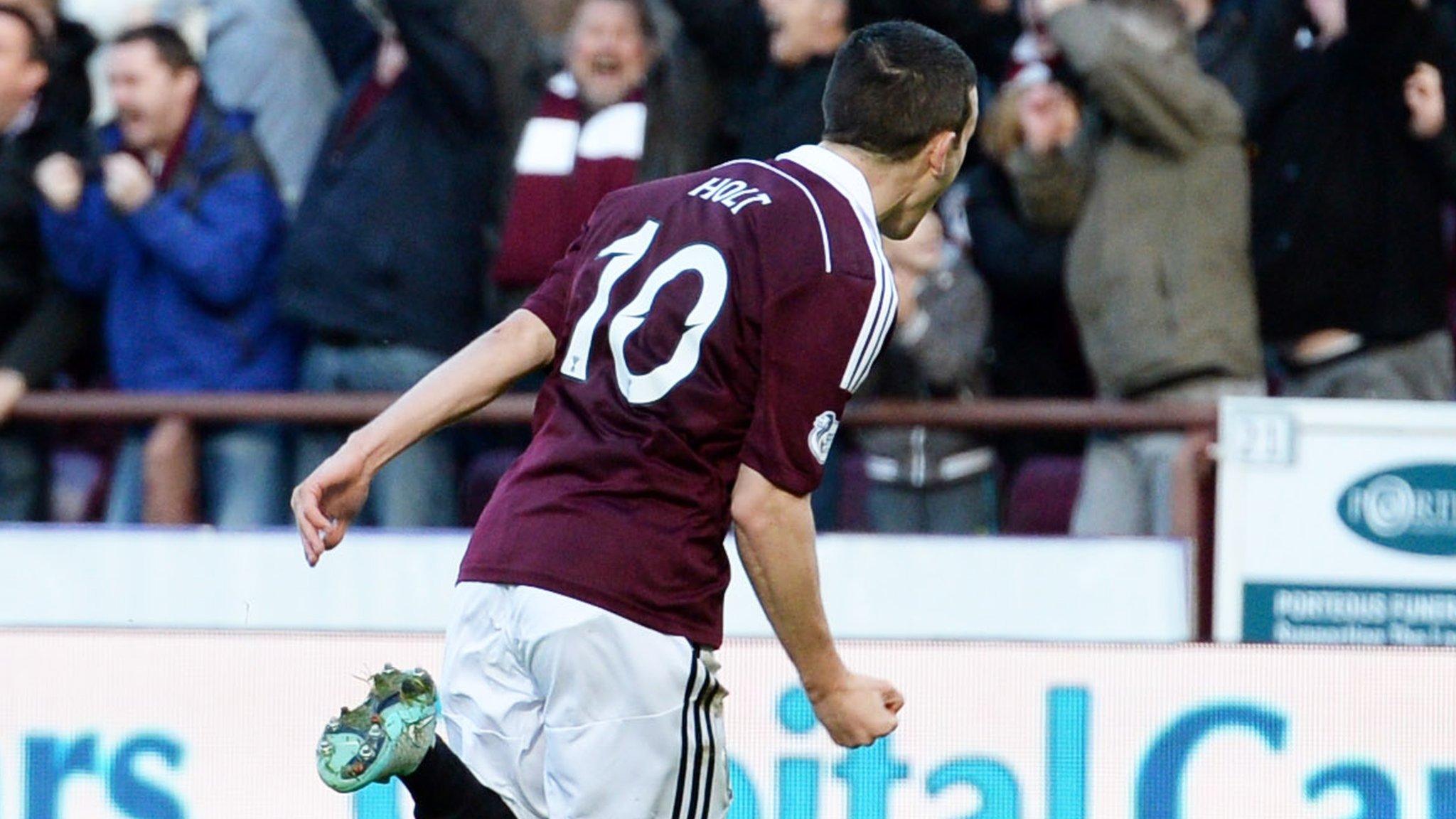 Jason Holt celebrates after scores for Hearts against Rangers