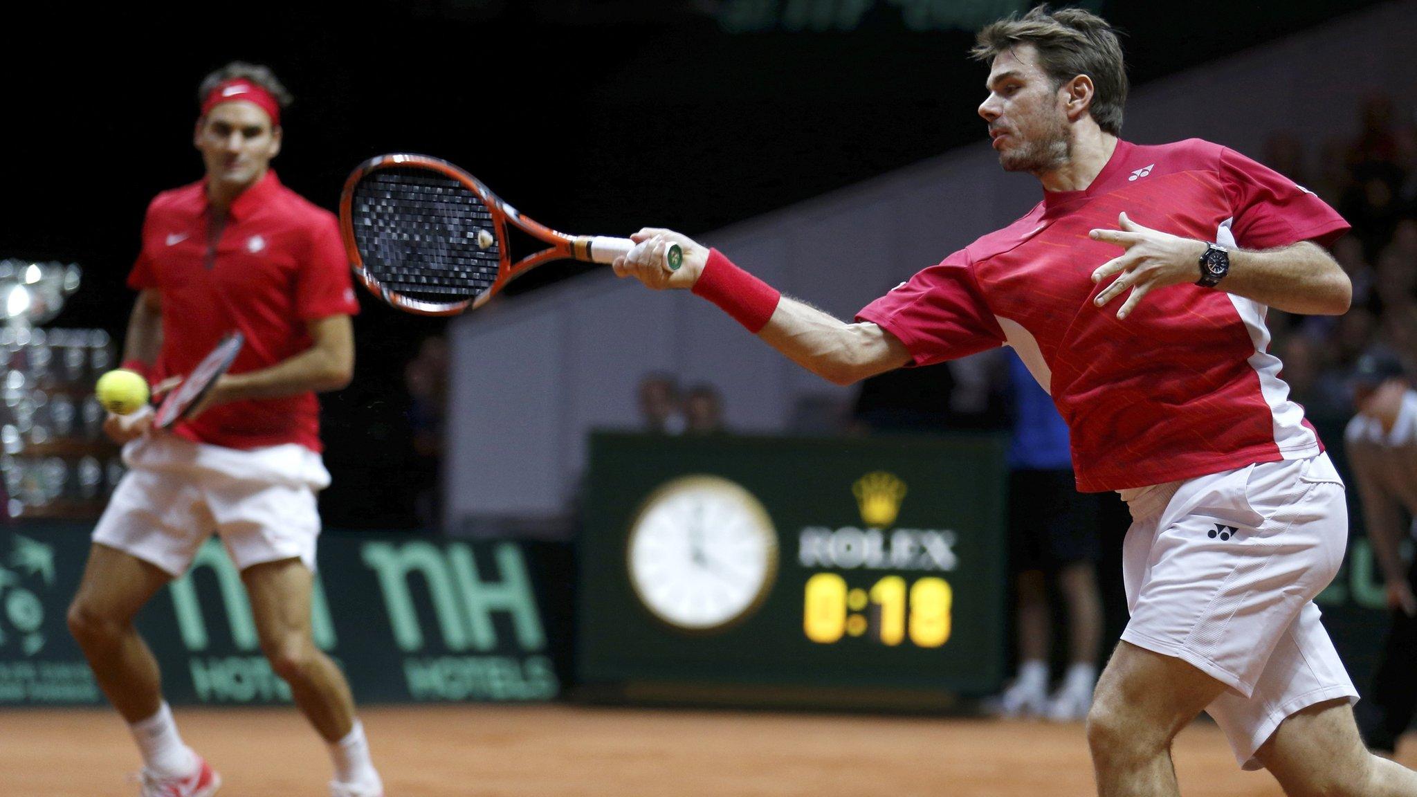 Roger Federer and Stan Warinka