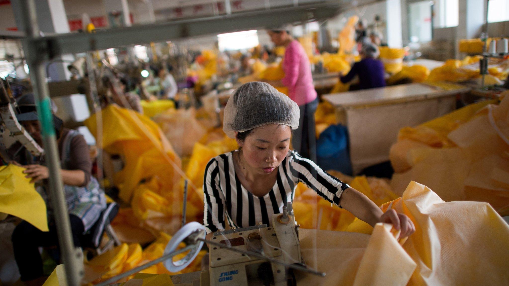 Factory workers outside of Beijing