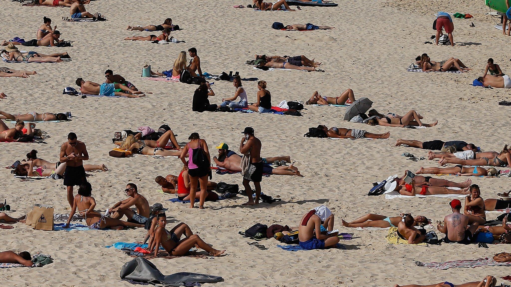 File photo: Members of the public enjoy the warm weather down at Bondi Beach in Sydney, Australia, 31 October 2014