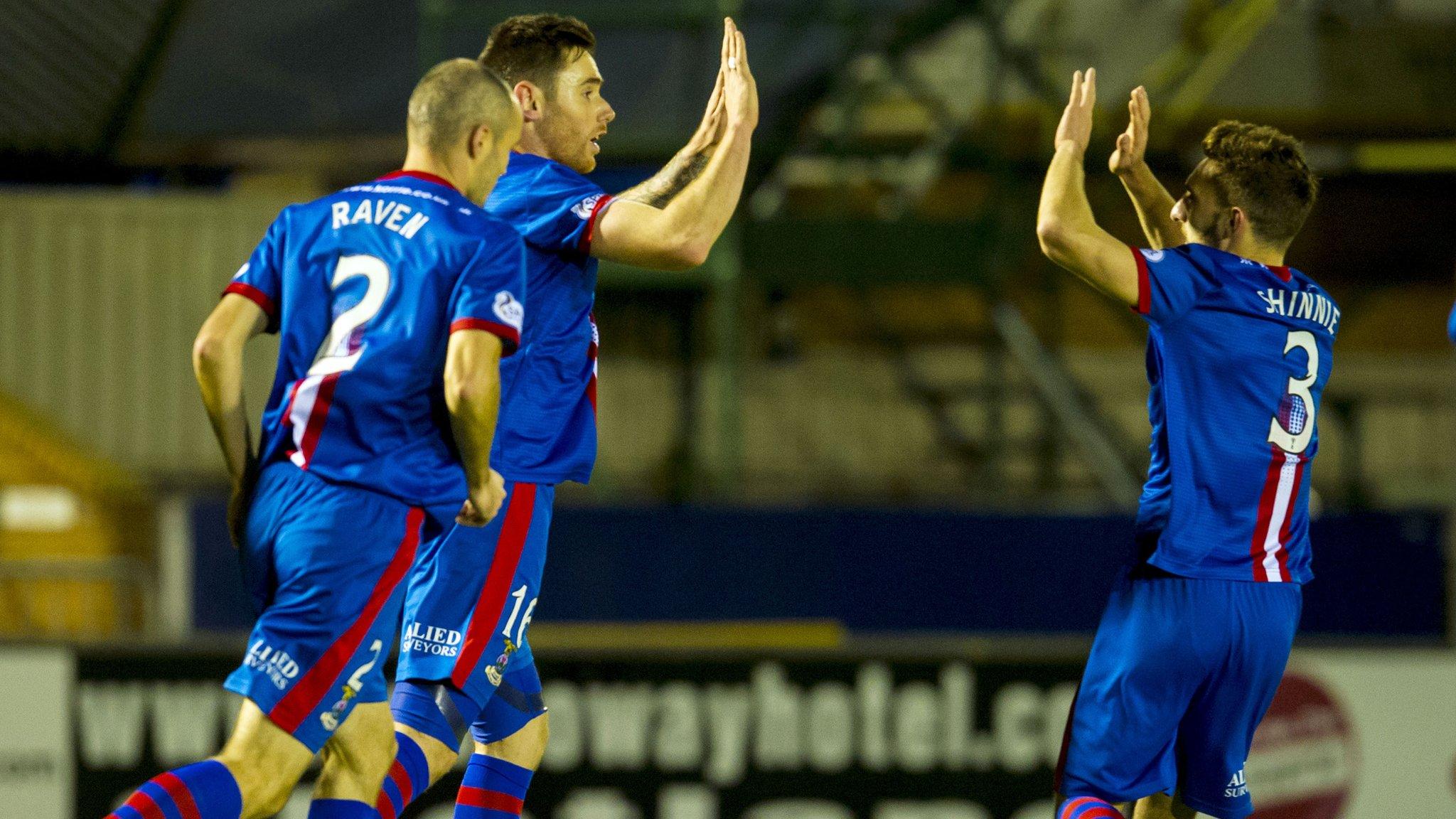 Greg Tansey celebrates