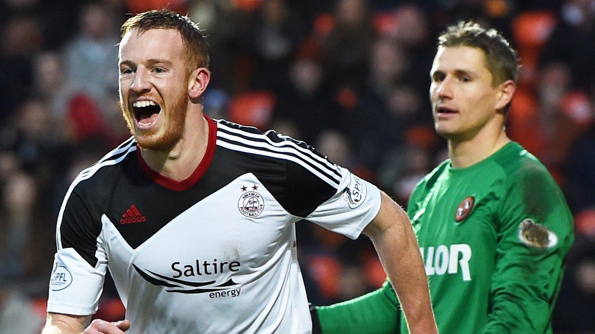 Adam Rooney celebrates his first for Aberdeen against Dundee United