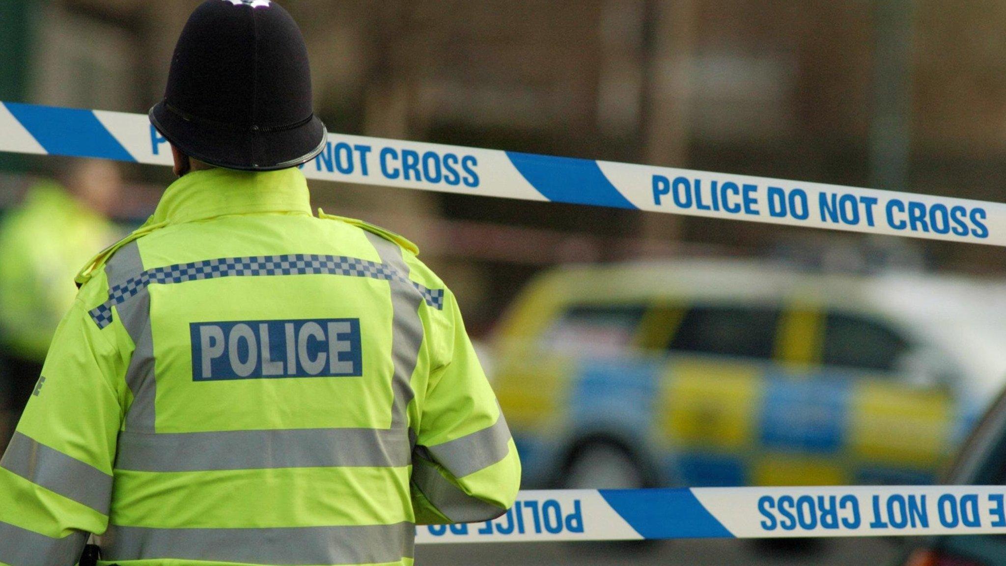 Police officer at a cordon