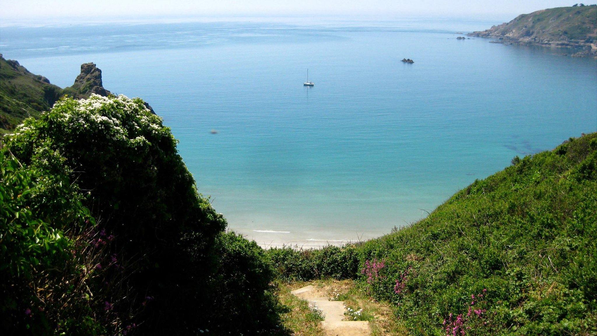 Steps down to Guernsey's Petit Port Bay