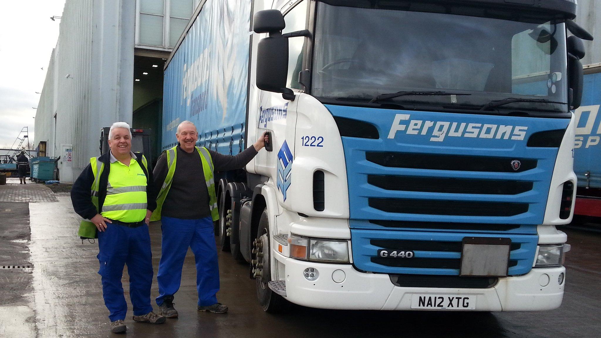 Mel Gwyn and Bryan Lee beside lorry