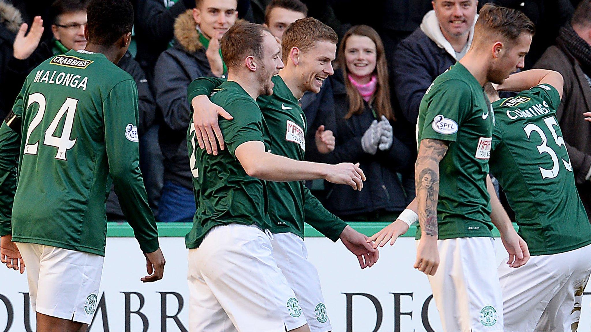 David Gray (centre) fired Hibs in front at Easter Road