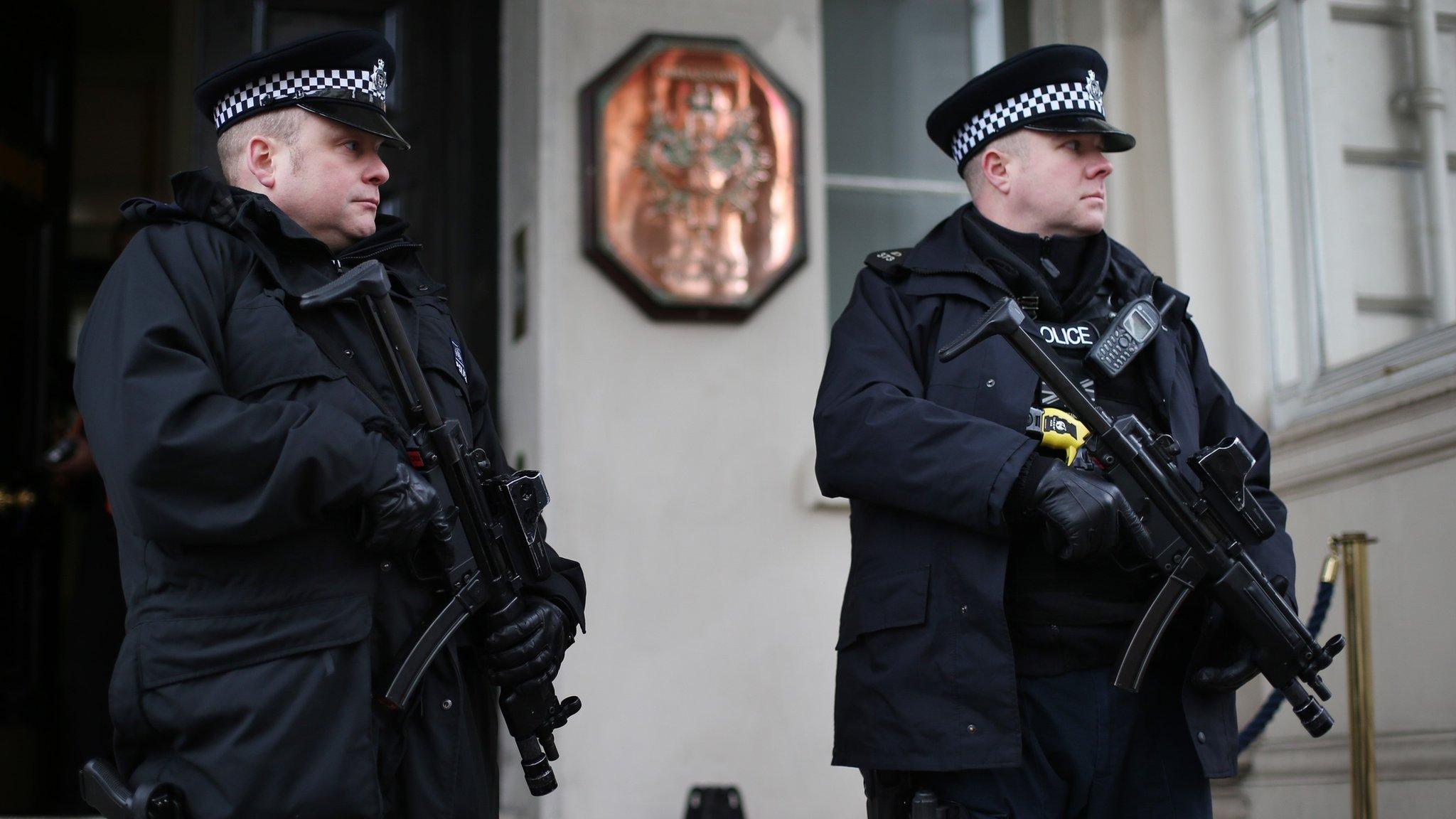 Armed police outside the French Embassy in London