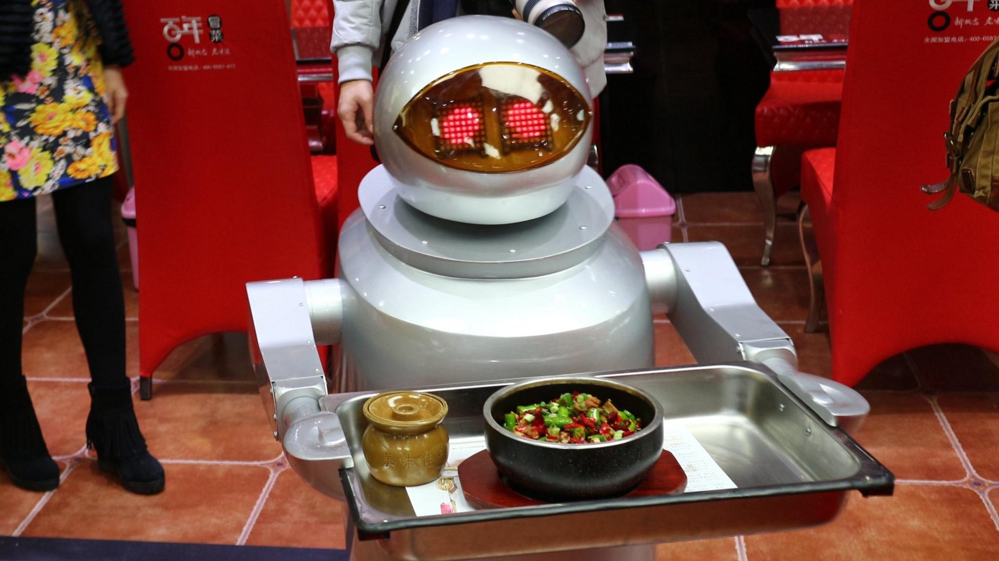 A robot waiter in a restaurant