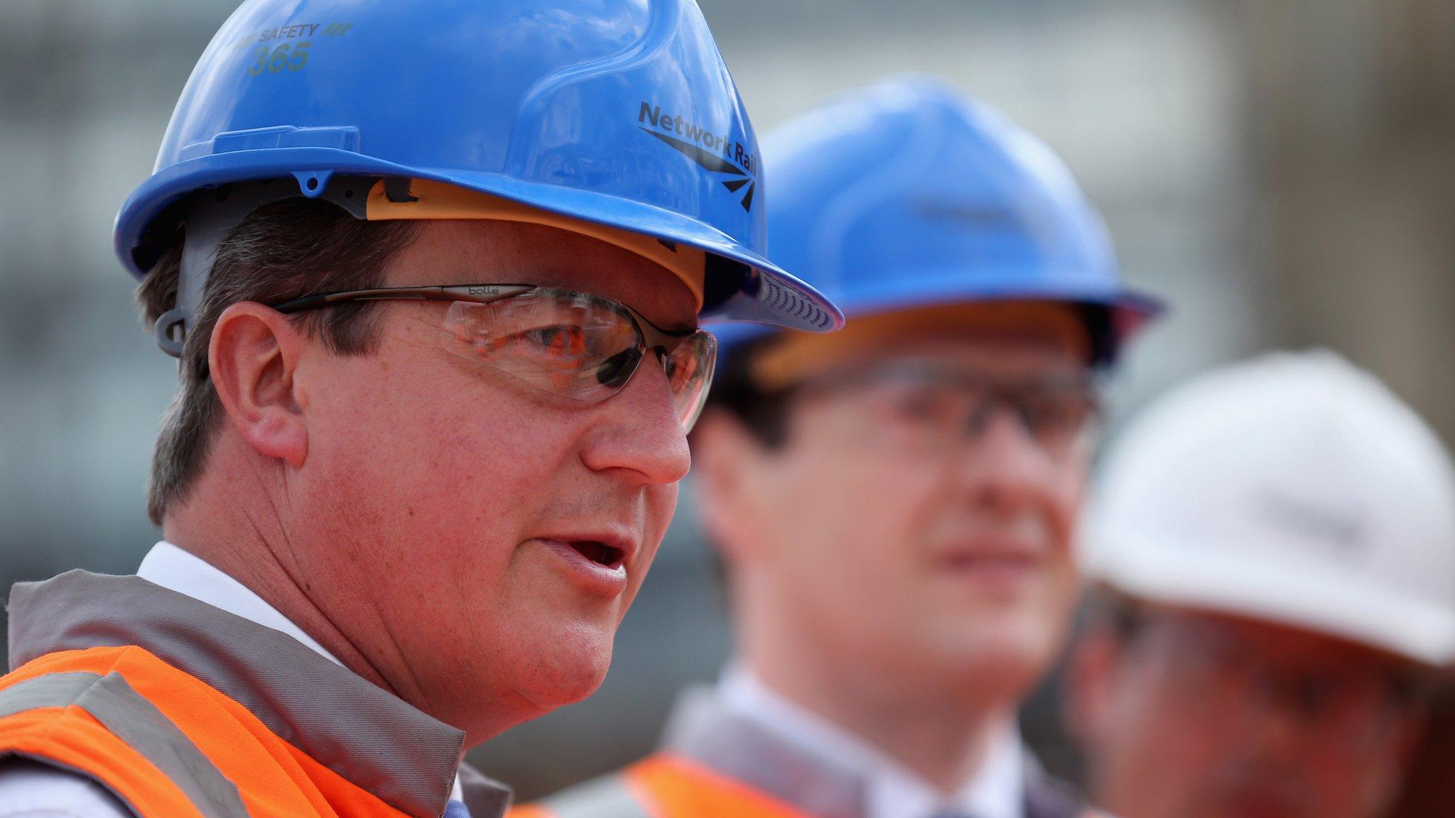 David Cameron in high vis and hard hat