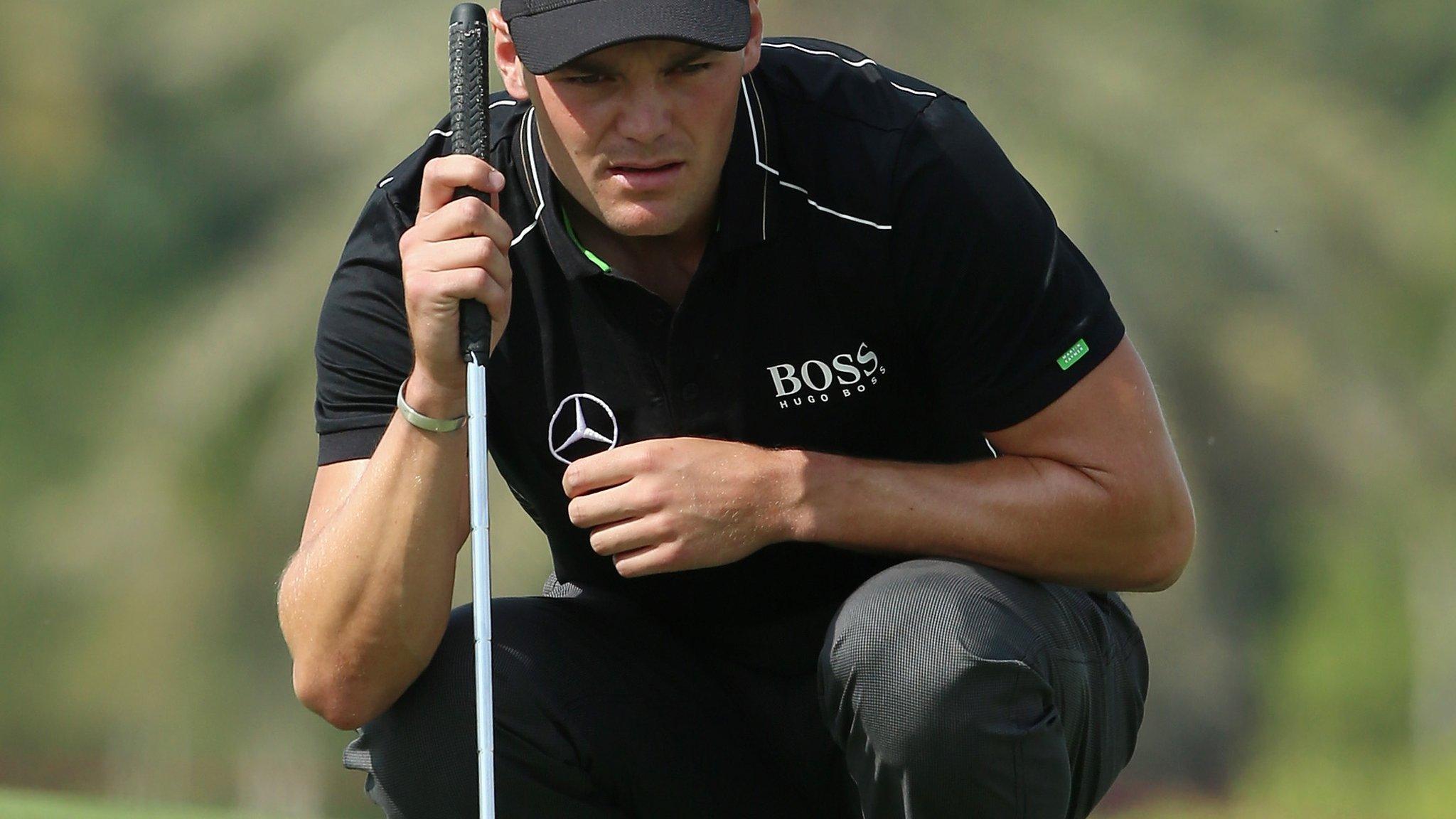 Martin Kaymer studies a putt during round three of the Abu Dhabi Golf Championship