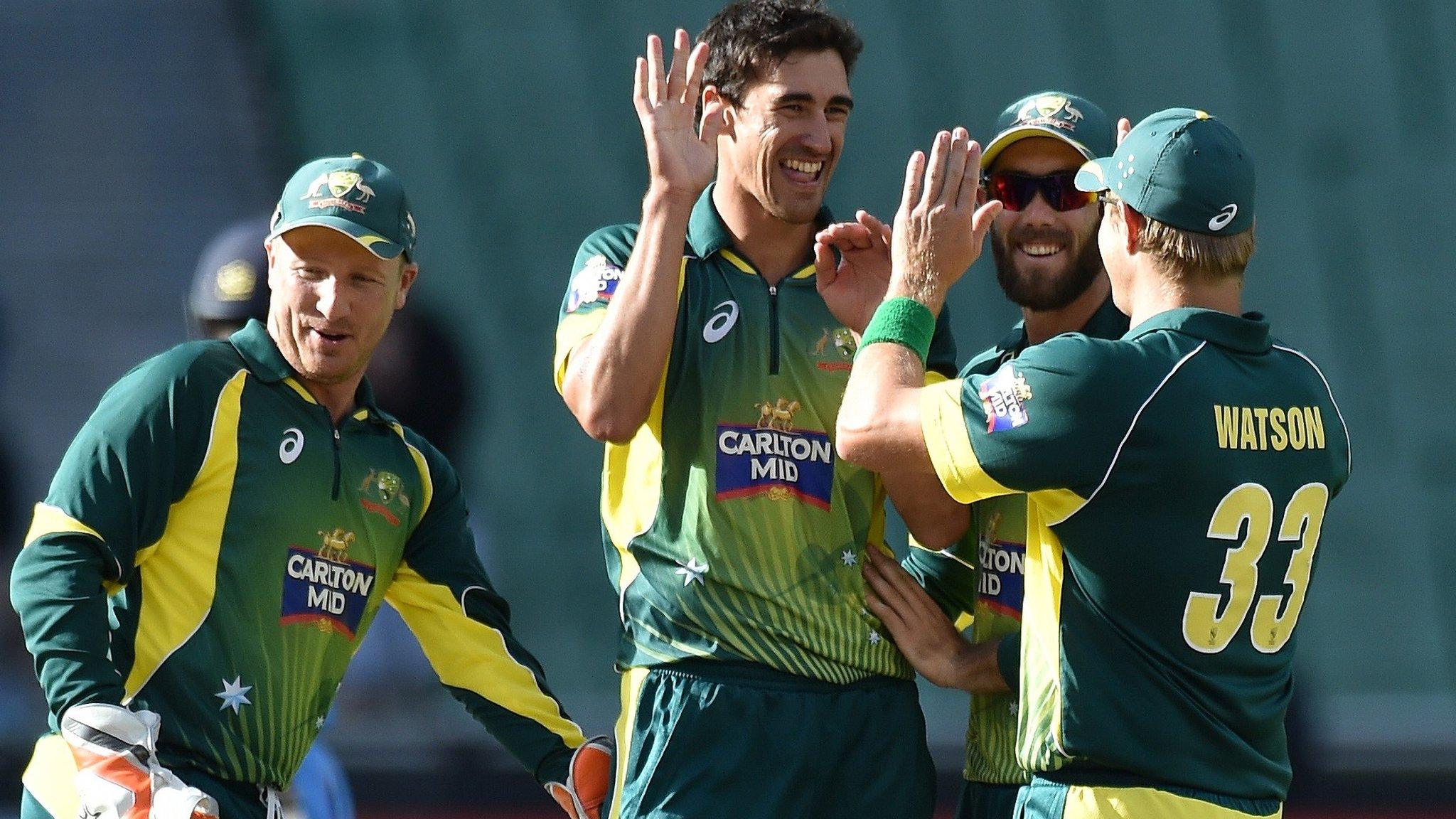 Australia celebrate a wicket against India at the MCG