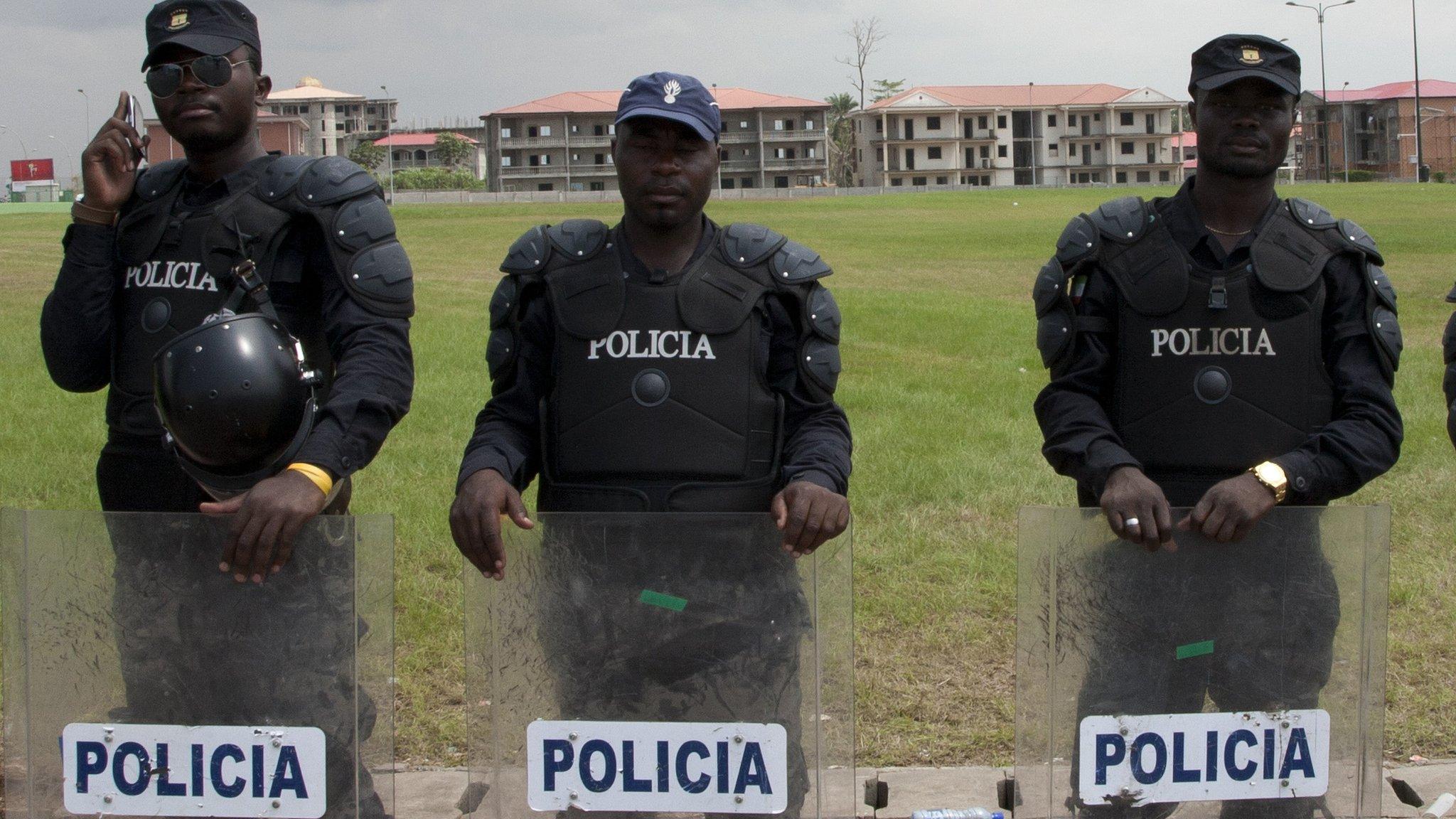 Police outside the stadium in Bata, on Wednesday