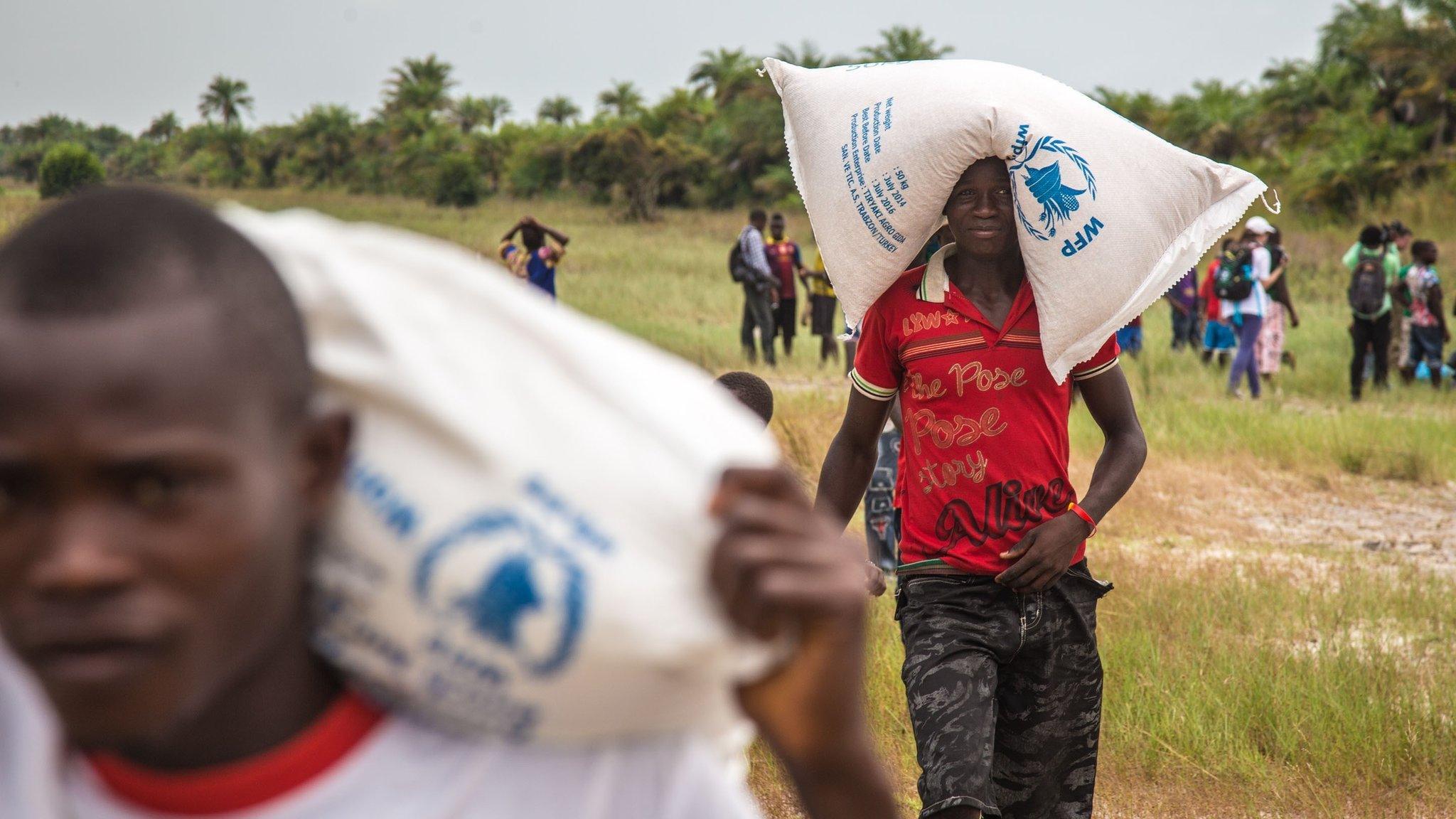 Aid carried from a Royal Navy helicopter in Sierra Leone in December 2014