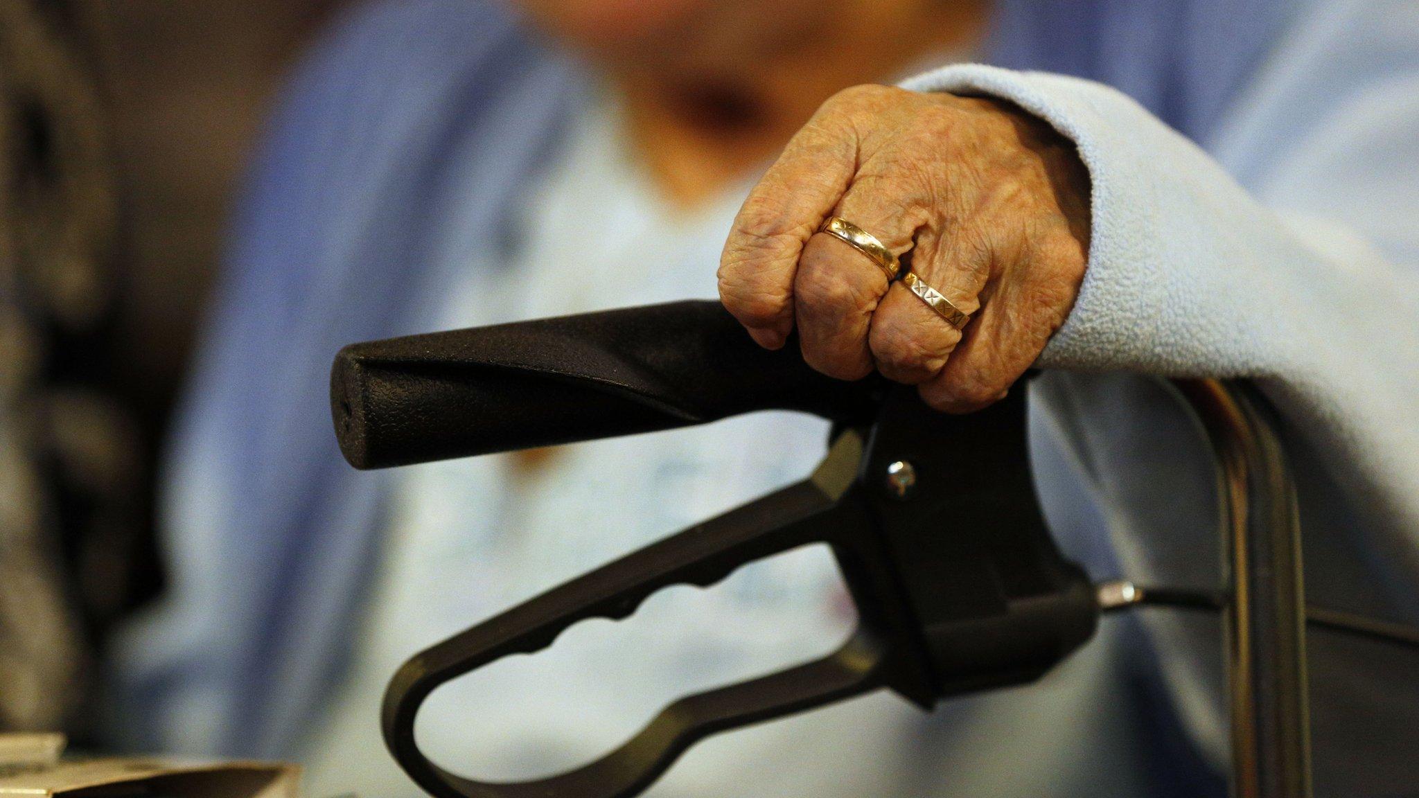 Elderly woman in wheelchair