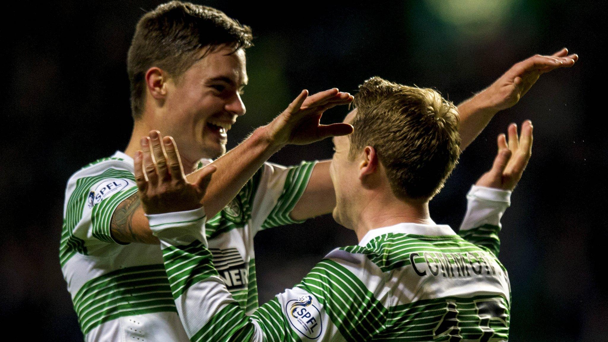 Celtic players Mikael Lustig and Kris Commons