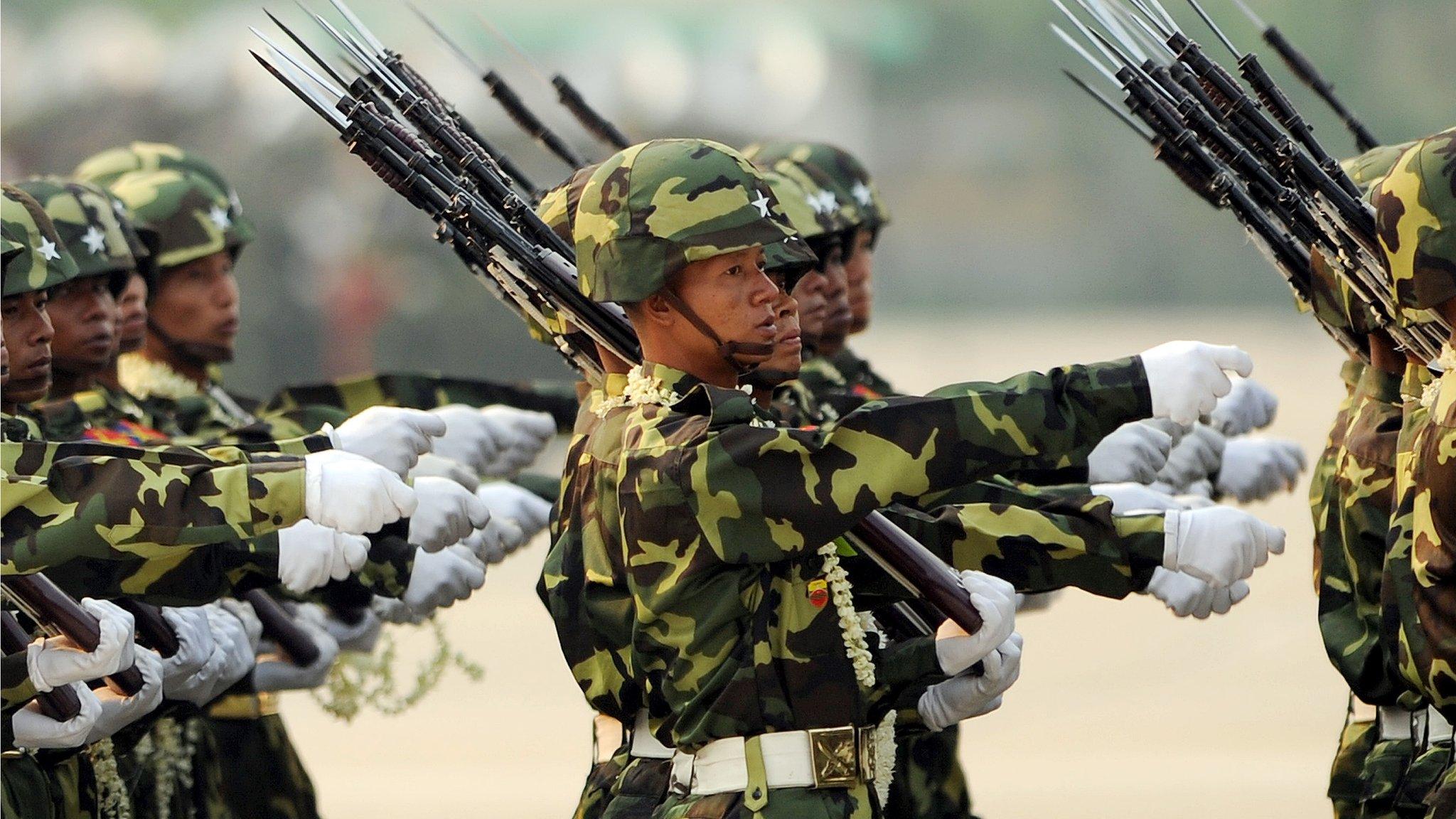 Myanmar soldiers take part in a military parade marking the 65th Armed Forces Day in Nay Pyi Daw on 27 March 2010