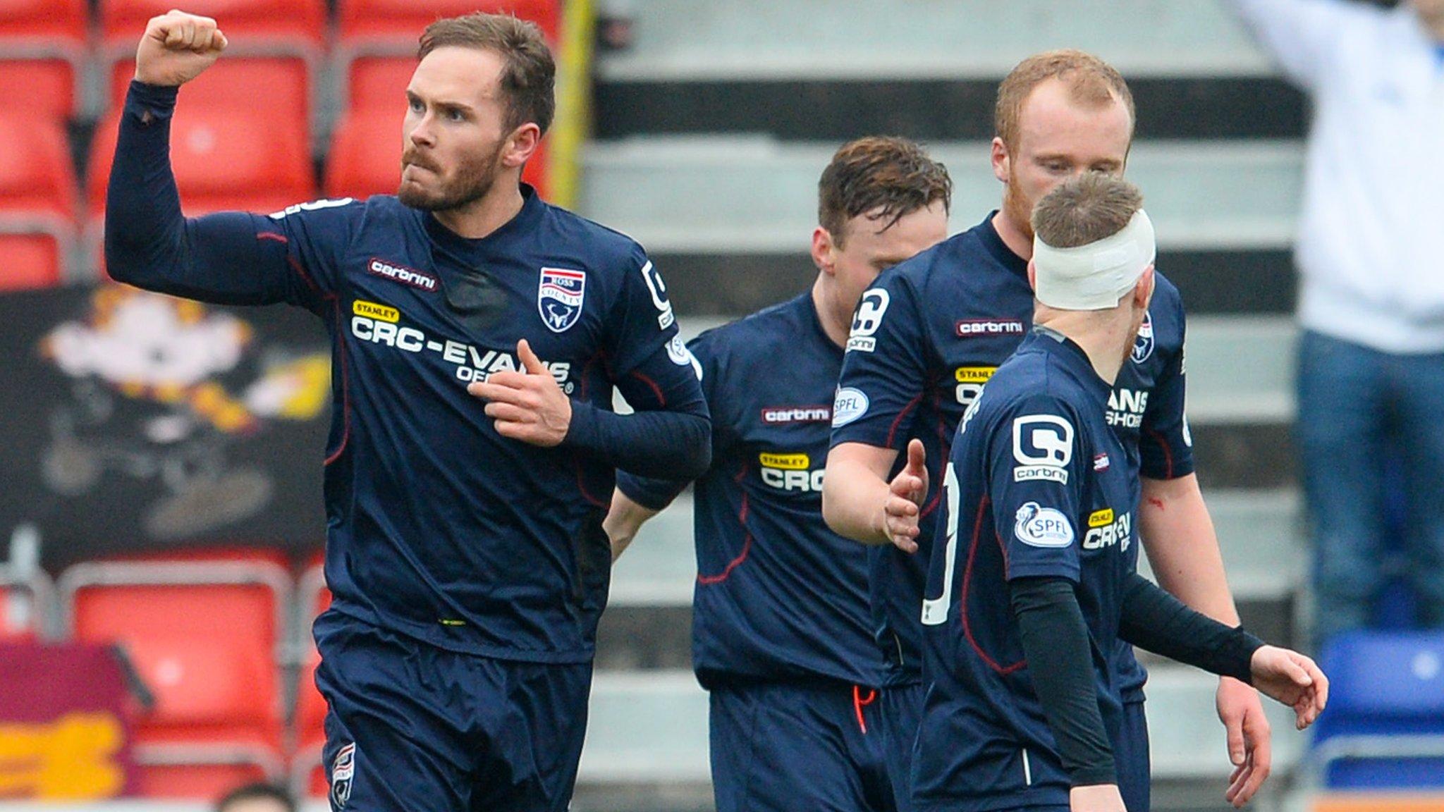 Martin Woods celebrates his first-half goal for Ross County