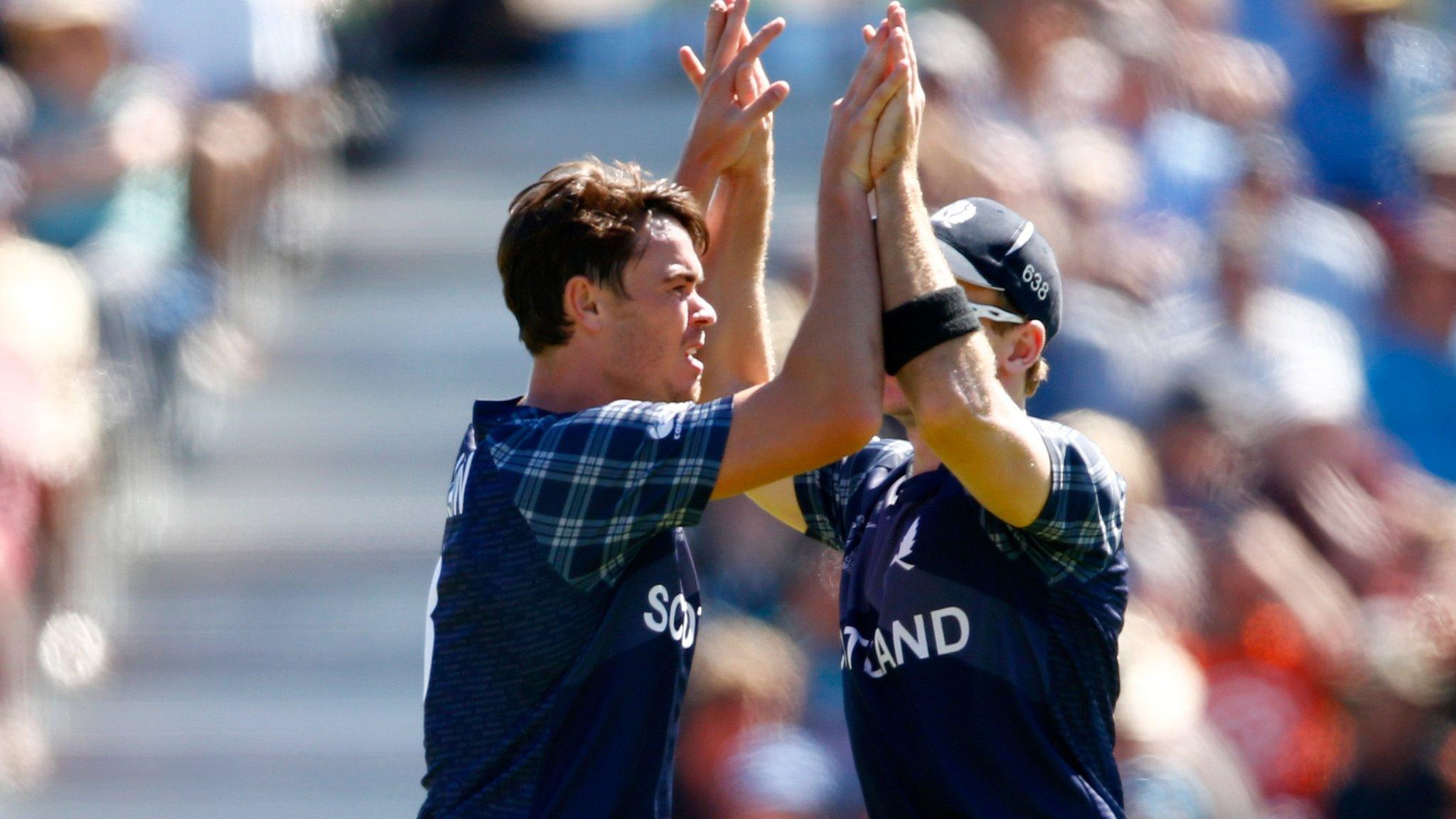 Scotland celebrate taking a New Zealand wicket