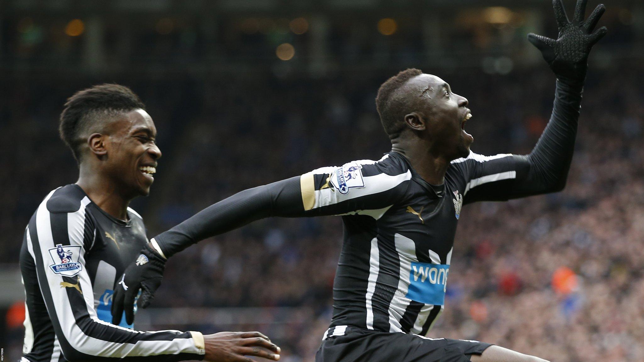 Newcastle striker Papiss Cisse celebrates his goal against Aston Villa