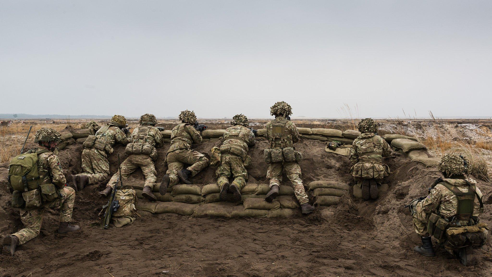 Soldiers from the 1st Battalion The Royal Welsh, scan the horizon for the enemy during Exercise Black Eagle in Poland.