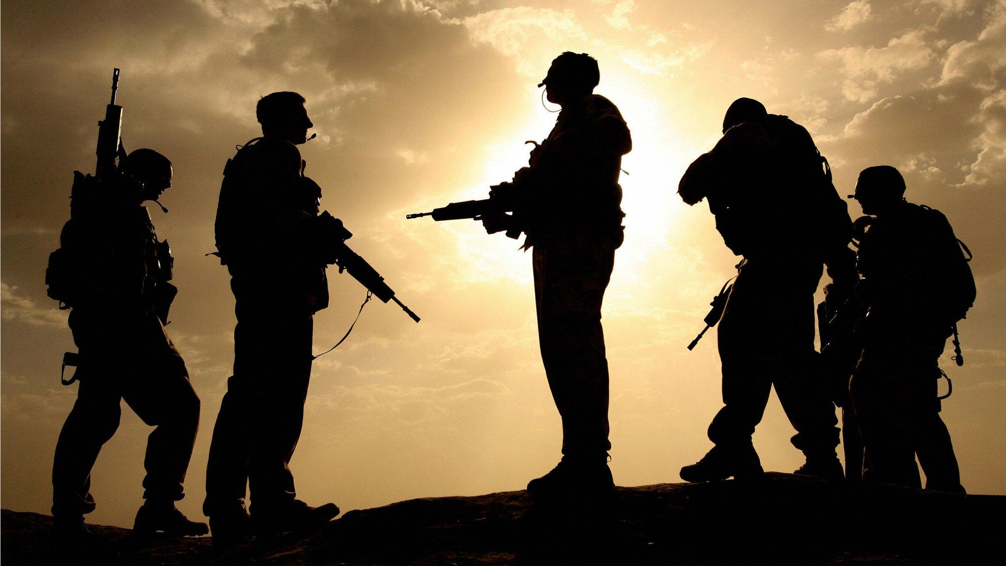 17 May 2006, British soldiers silhouetted against the sky in Helmand province, Afghanistan