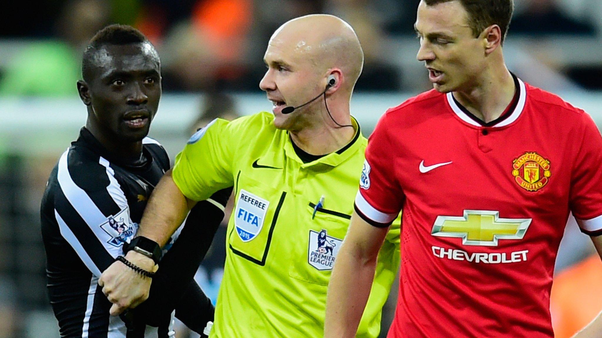 Papiss Cisse and Jonny Evans