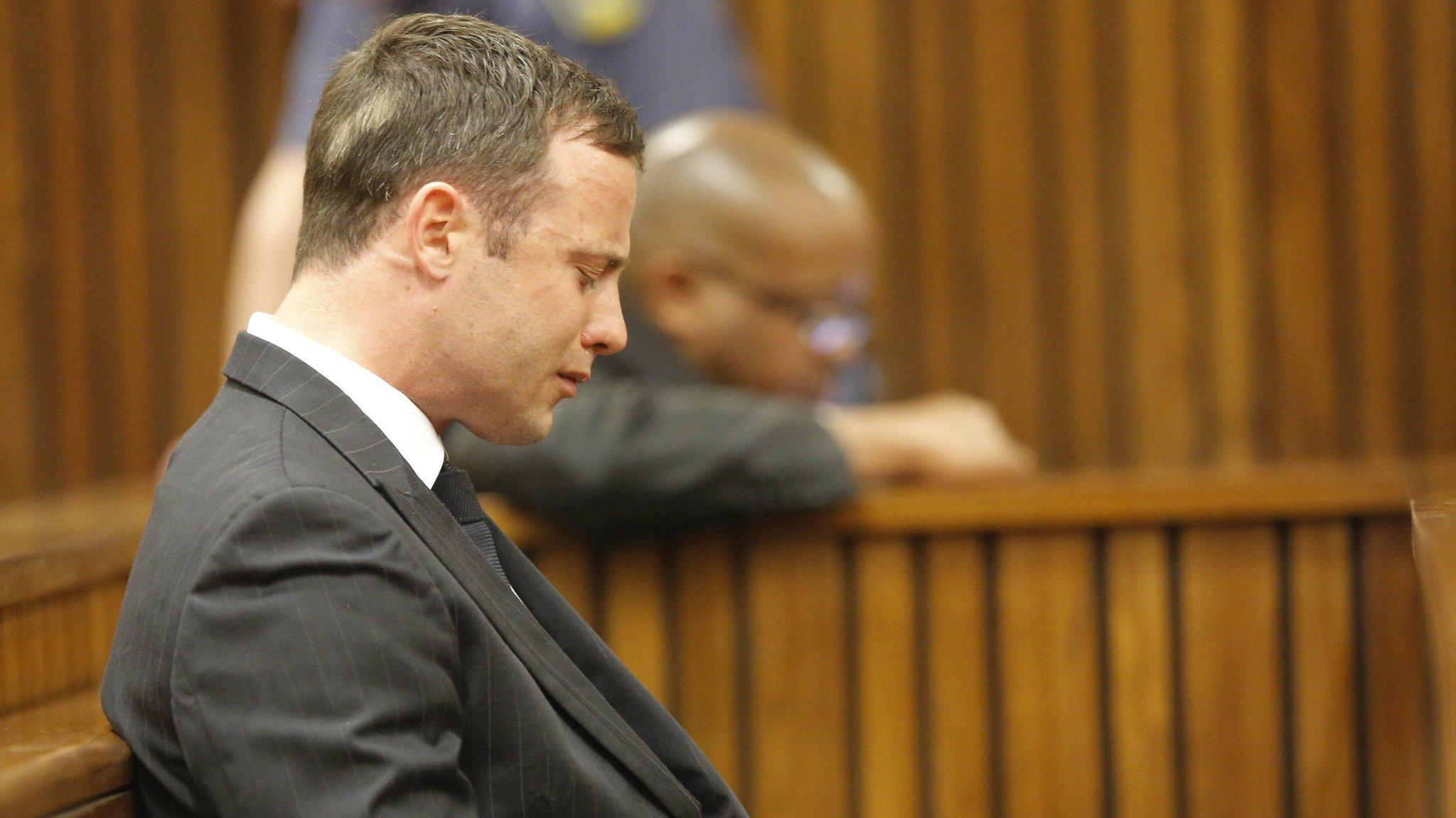 Oscar Pistorius reacts in the Pretoria High Court on 11 September 2014