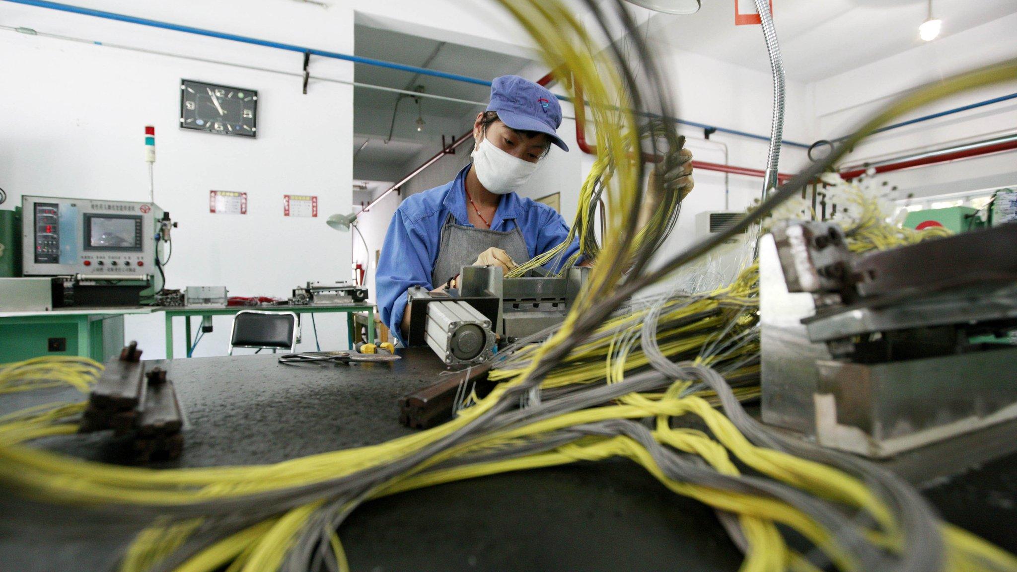 A woman works in a civil explosives factory in Huaibei, east China's Anhui province.