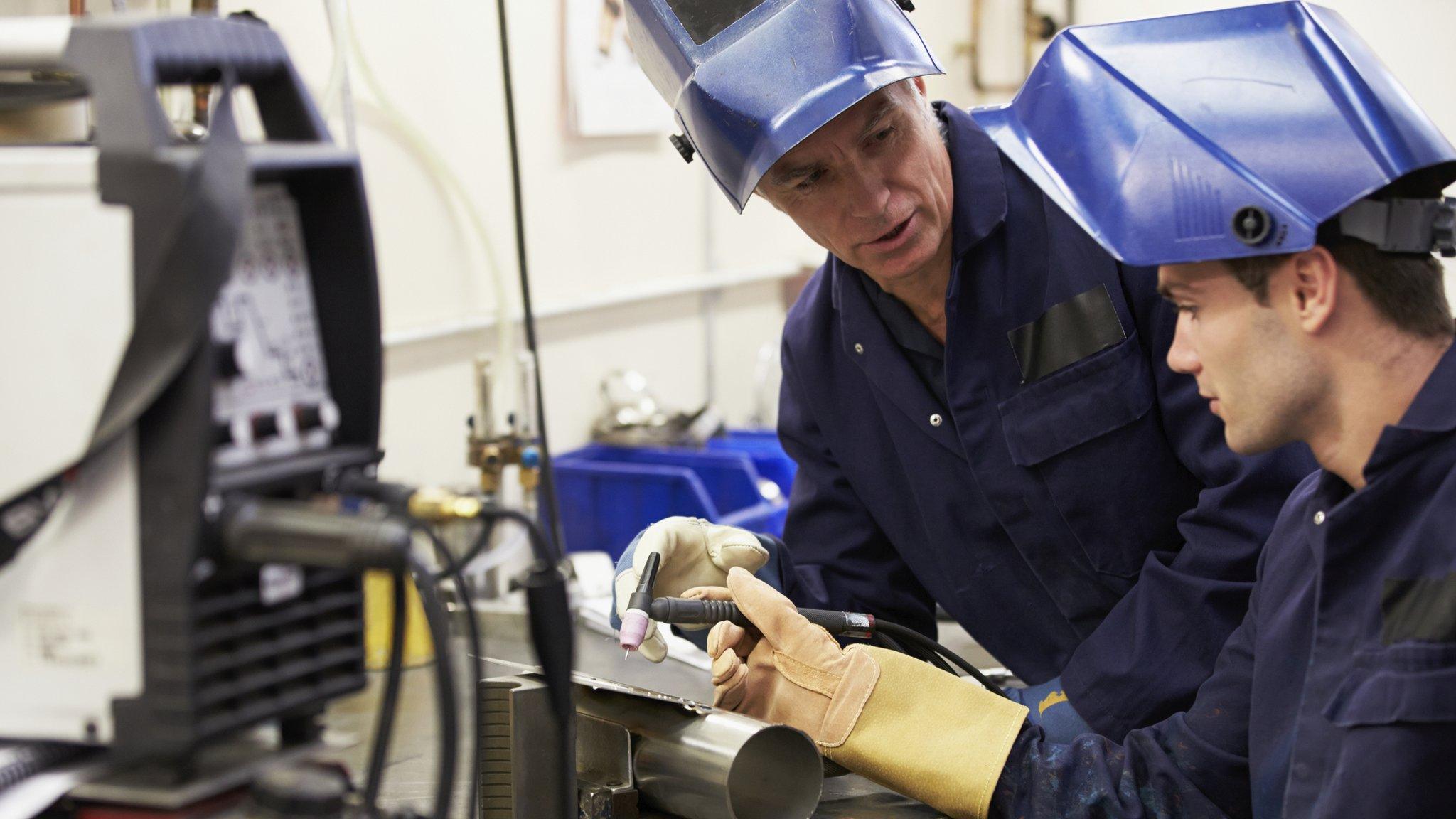 Apprentice receiving instruction