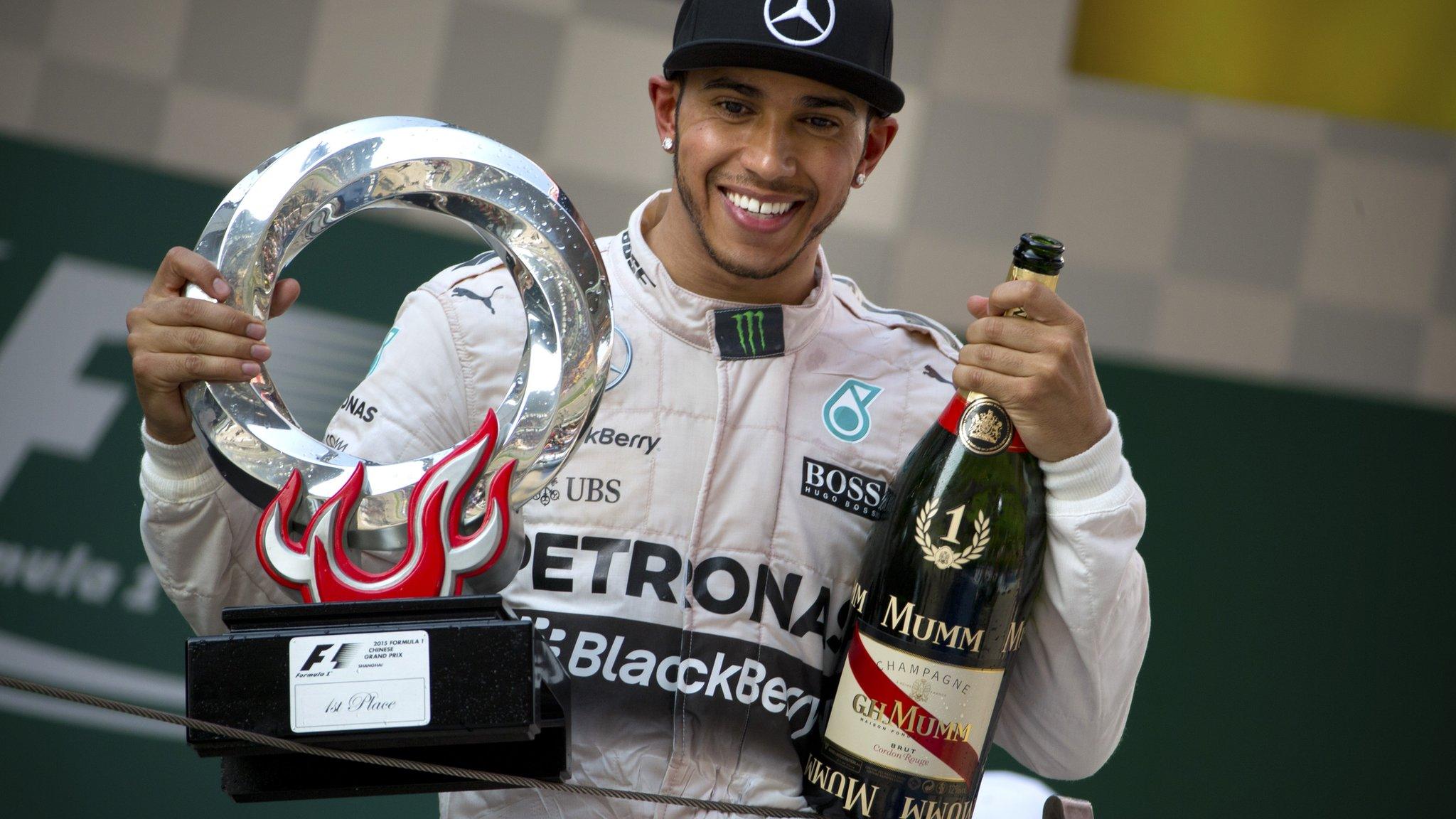 Lewis Hamilton celebrates winning the Chinese Grand Prix