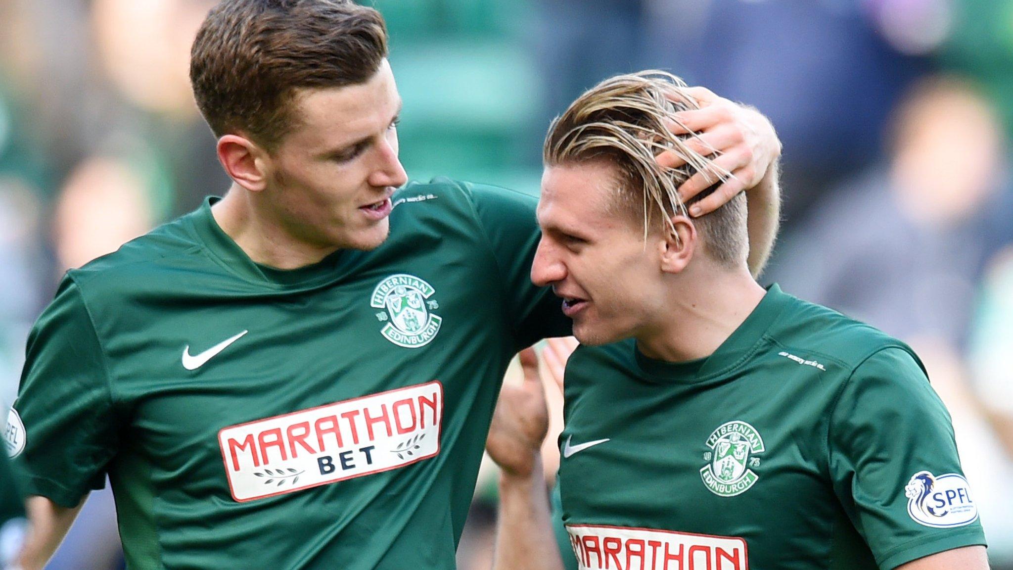 Paul Hanlon and Jason Cummings celebrate Hibernian's win