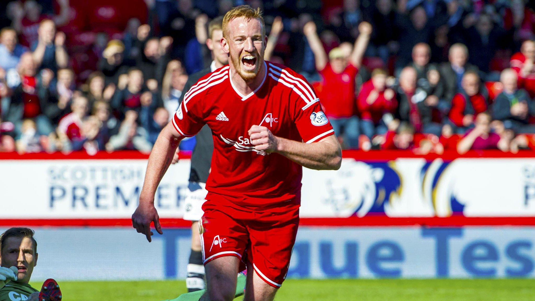 Adam Rooney celebrates after scoring for Aberdeen against Dundee United