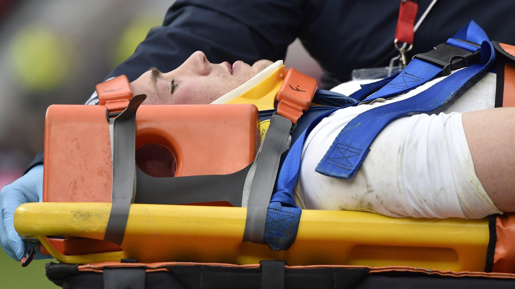 England full-back Mike Brown is taken off on a stretcher