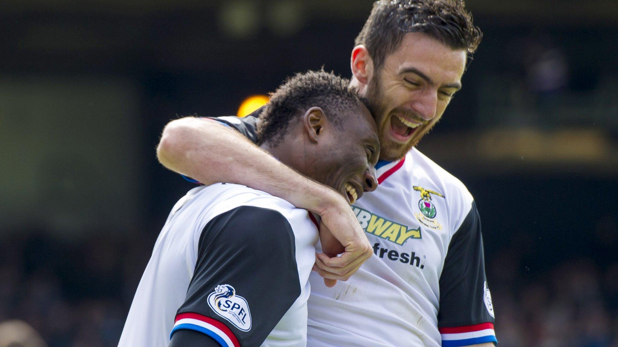 Edward Ofere (left) celebrates his goal with ICT team-mate Ross Draper