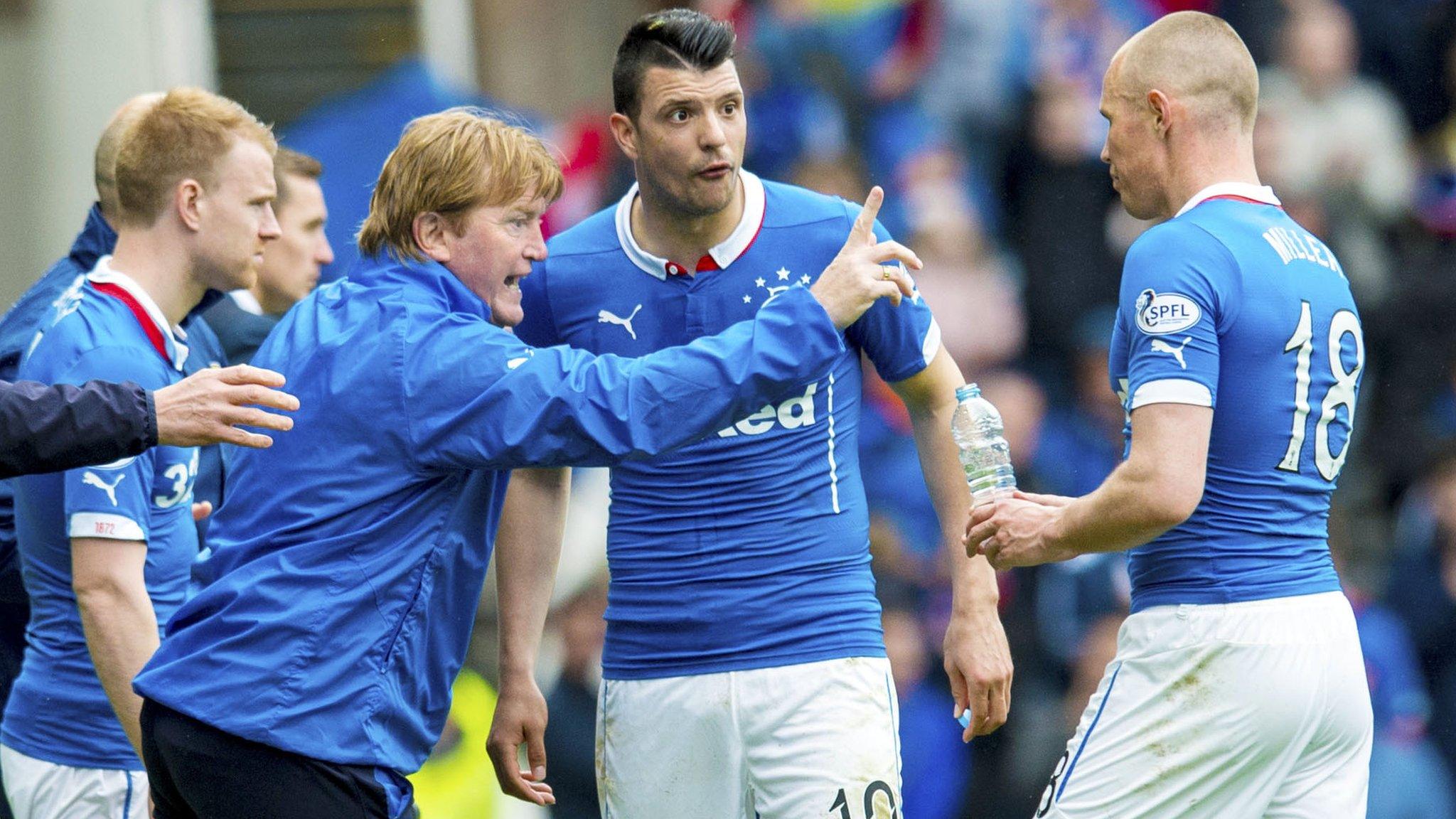 Rangers manager Stuart McCall speaks with Haris Vuckic (centre) and Kenny Miller (right)