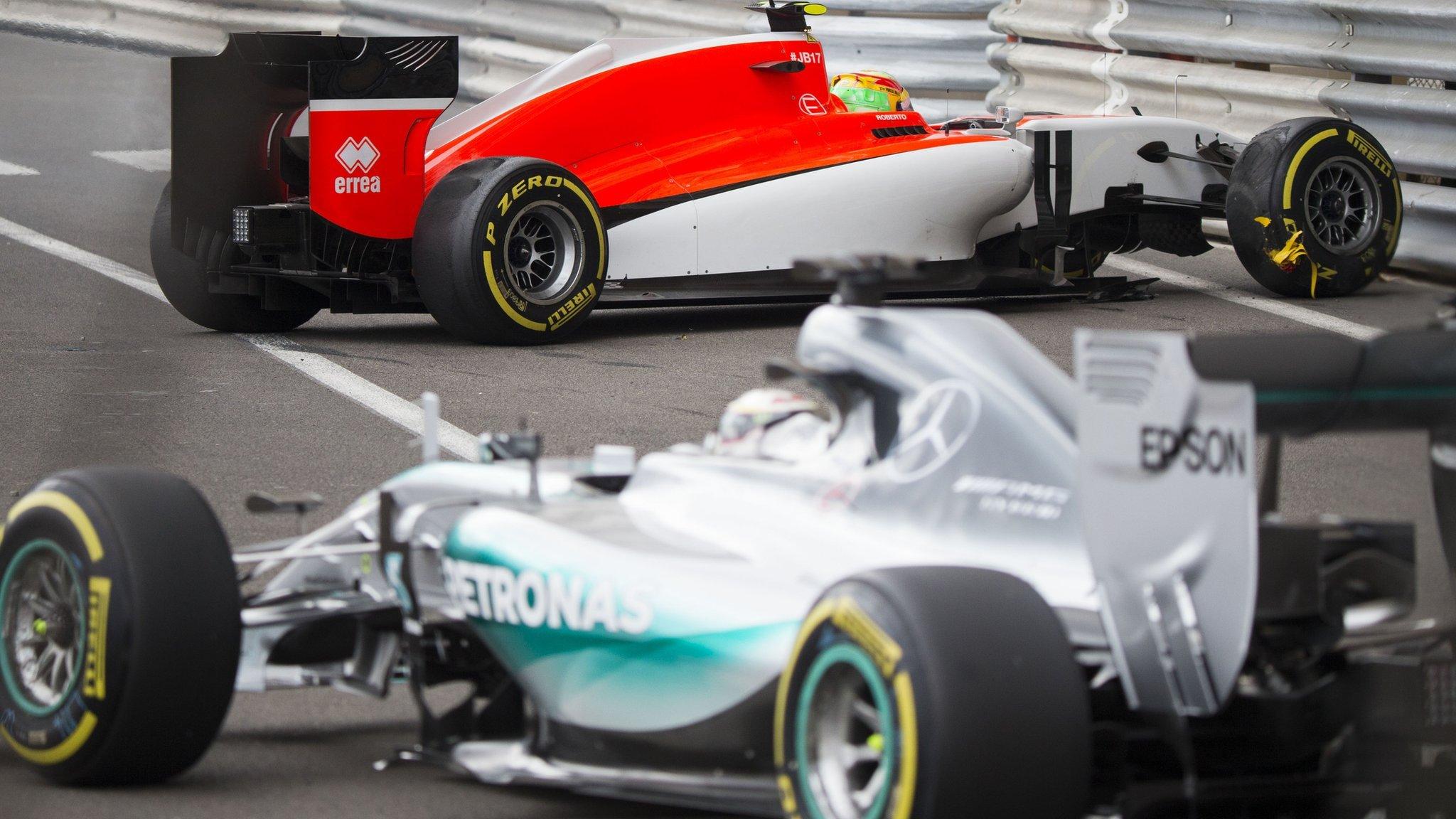 Lewis Hamilton and Roberto Merhi