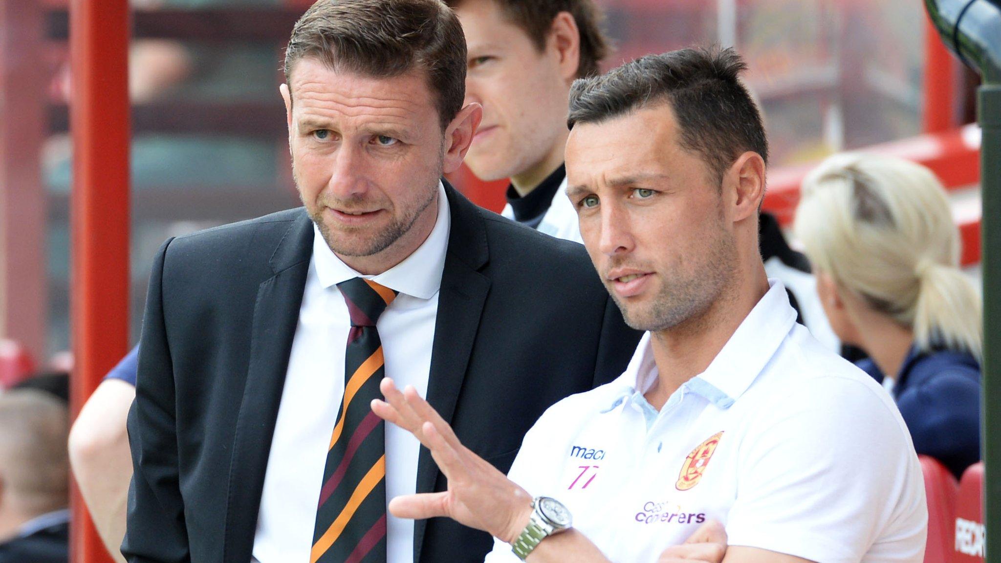 Ian Baraclough looks on with rested striker Scott McDonald