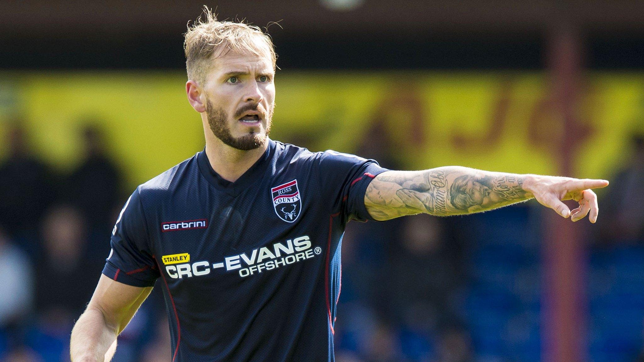 Martin Woods playing for Ross County