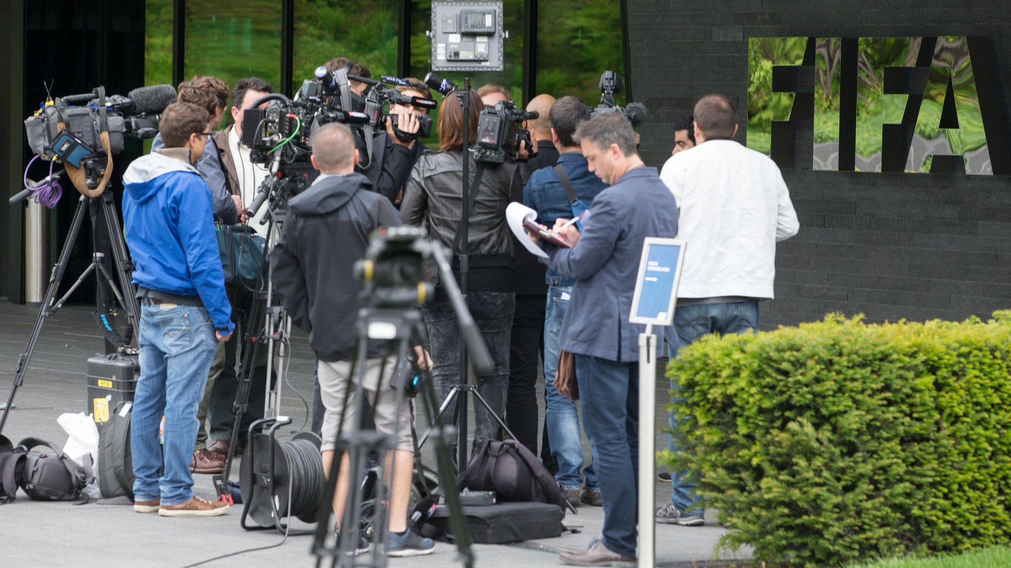 Reporters outside Fifa HQ, Zurich (27 May)