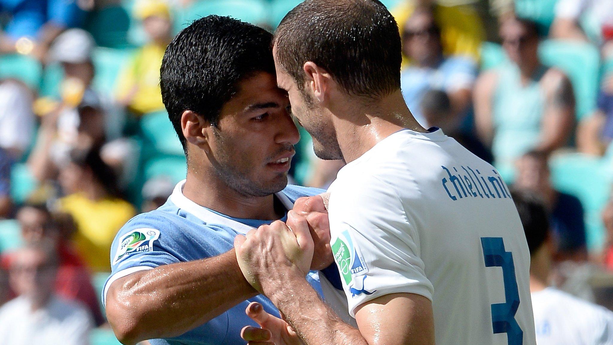 Giorgio Chiellini and Luis Suarez