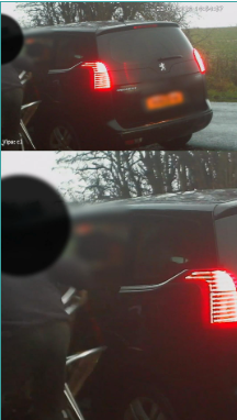 A man flytipping out of the back of his car