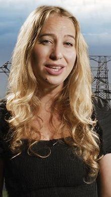 Presenter Sophia Herod with an image of pylons behind her