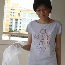 Elisa Ng with rubbish bag