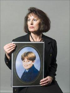 Ann Oakes-Odger with a picture of her son