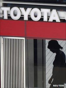 Woman outside Toyota building