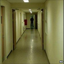 Corridor with guard at Yarl's Wood detention centre in Bedford