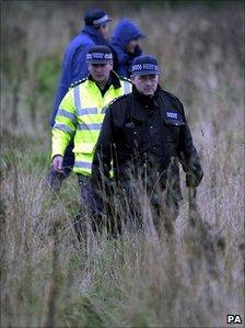 Metropolitan police search a Worcestershire field