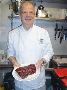 Chef Runnar Thorarinsson serves up a plate of whale meat